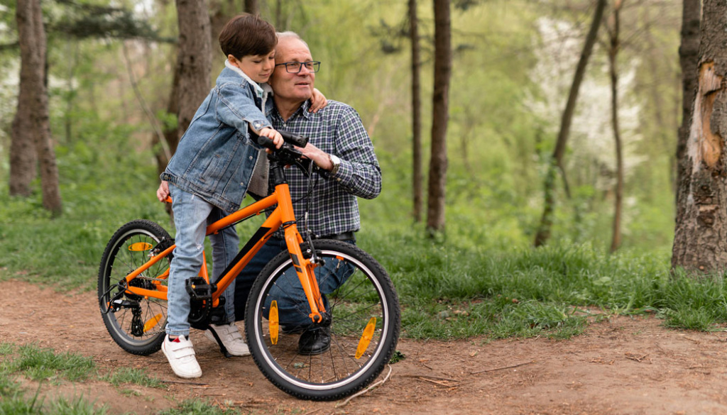 grandfather-teaching-his-grandson-how-ride-bike1050x600.jpg